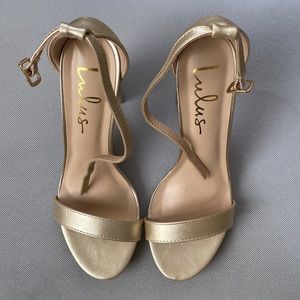 Lulu’s gold heels